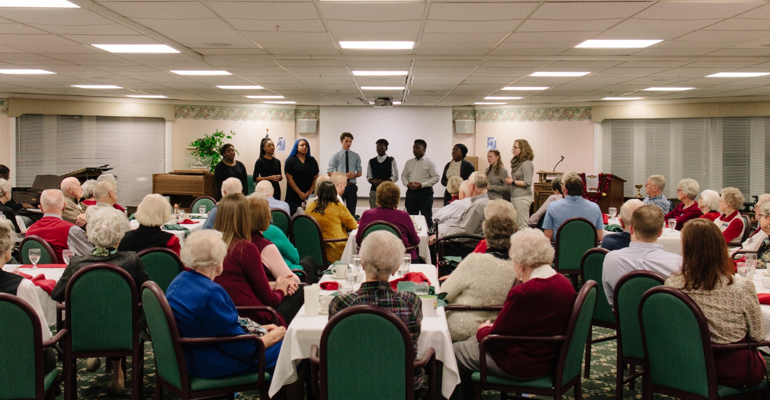 The choir performs at Raybrook Manor